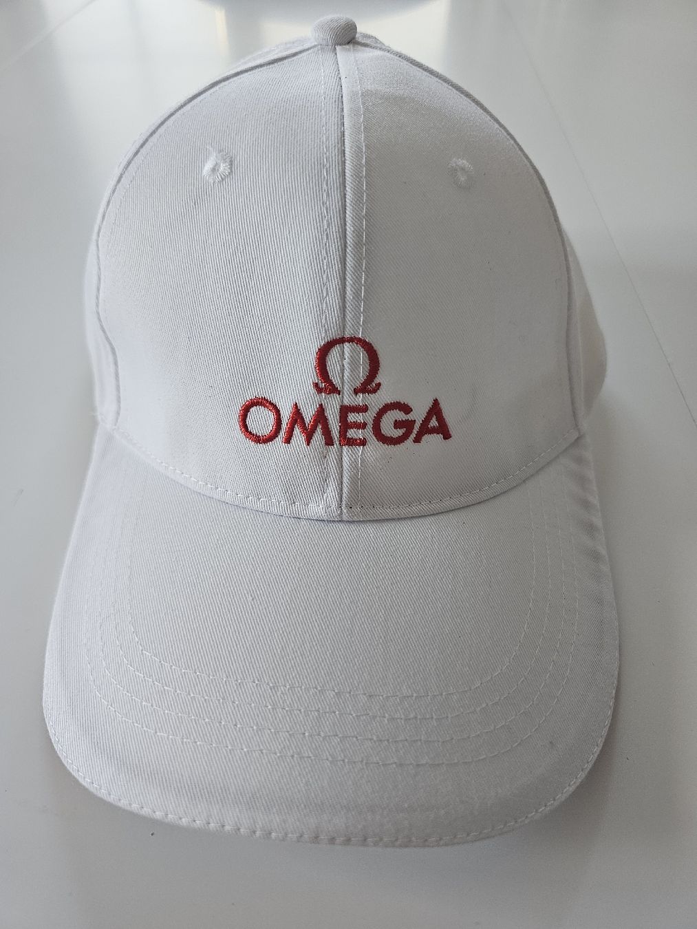 Copricapi, berretti & cappellini: Original Omega Kappe in Weiss – Nuovo (secondo la descrizione) da Muri b. Bern venduto da nickkeller