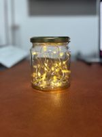 Glas mit Lichterkette, Deko für Herbst und Winterzeit
