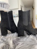 Stiefeletten mit Plateauabsatz