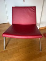 Fauteuil en cuir rouge