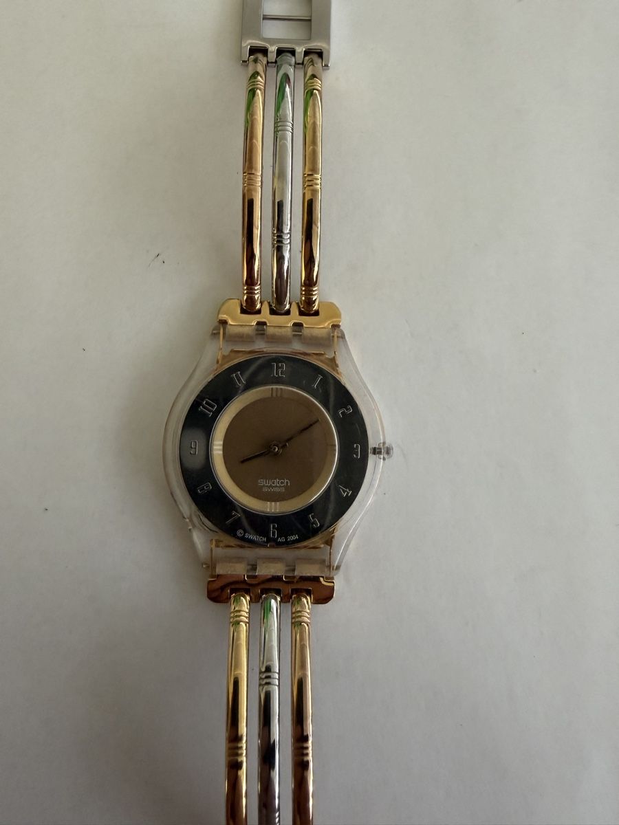 Swatch Uhren: Montre Swatch Skin "Tri-Gold" – Gebraucht aus Echallens von JAR69
