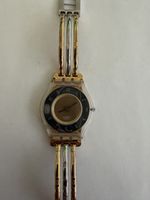 Montre Swatch Skin "Tri-Gold"