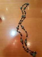 Das ist ein schönes Collier aus Glasperlen.