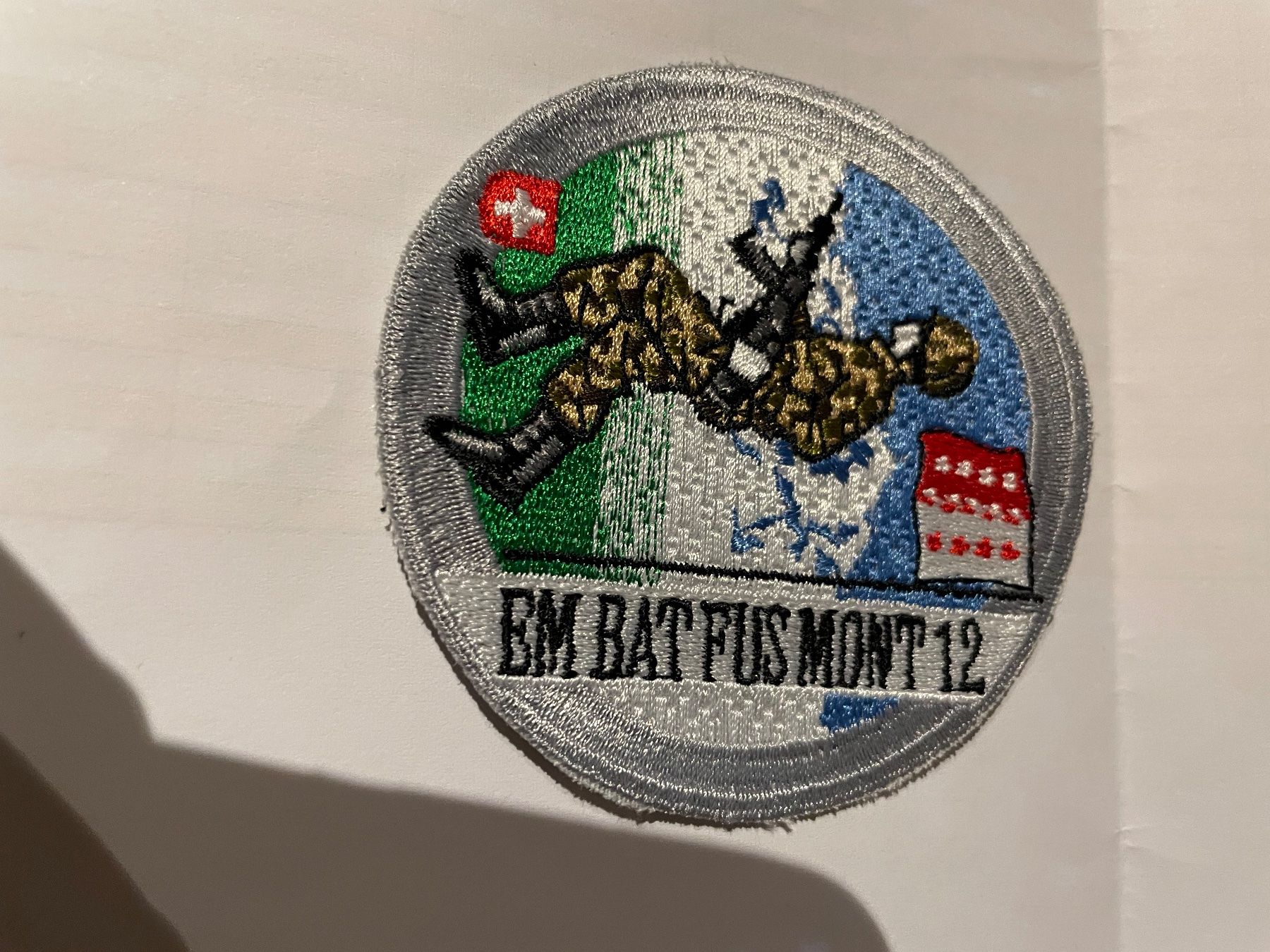 Schweizer Armee Toppe: Badge EM Bat fus Mont 12 – Usato da Oberiberg venduto da reimet