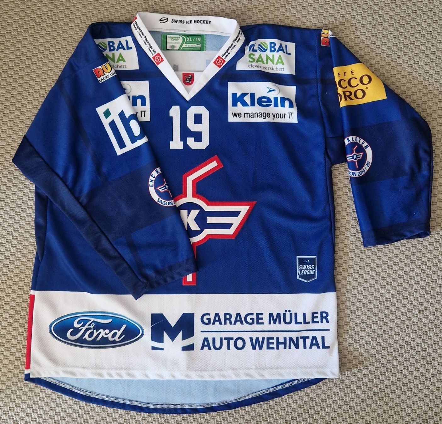 EHC Kloten Canottiere & Pantaloni: EHC Kloten Eishockeyleibchen - Kellenberger #19 - 2019/2020 – Nuovo (secondo la descrizione) da Neerach venduto da Fi_jil 2
