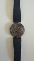 Montre Tissot RockWatch vintage cadran pierre marbrée