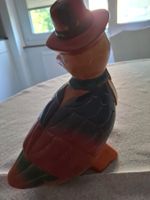 Canard en bois vintage avec chapeau