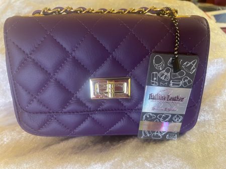 Sac à bandoulière ou à main matelassé violet cuir neuf