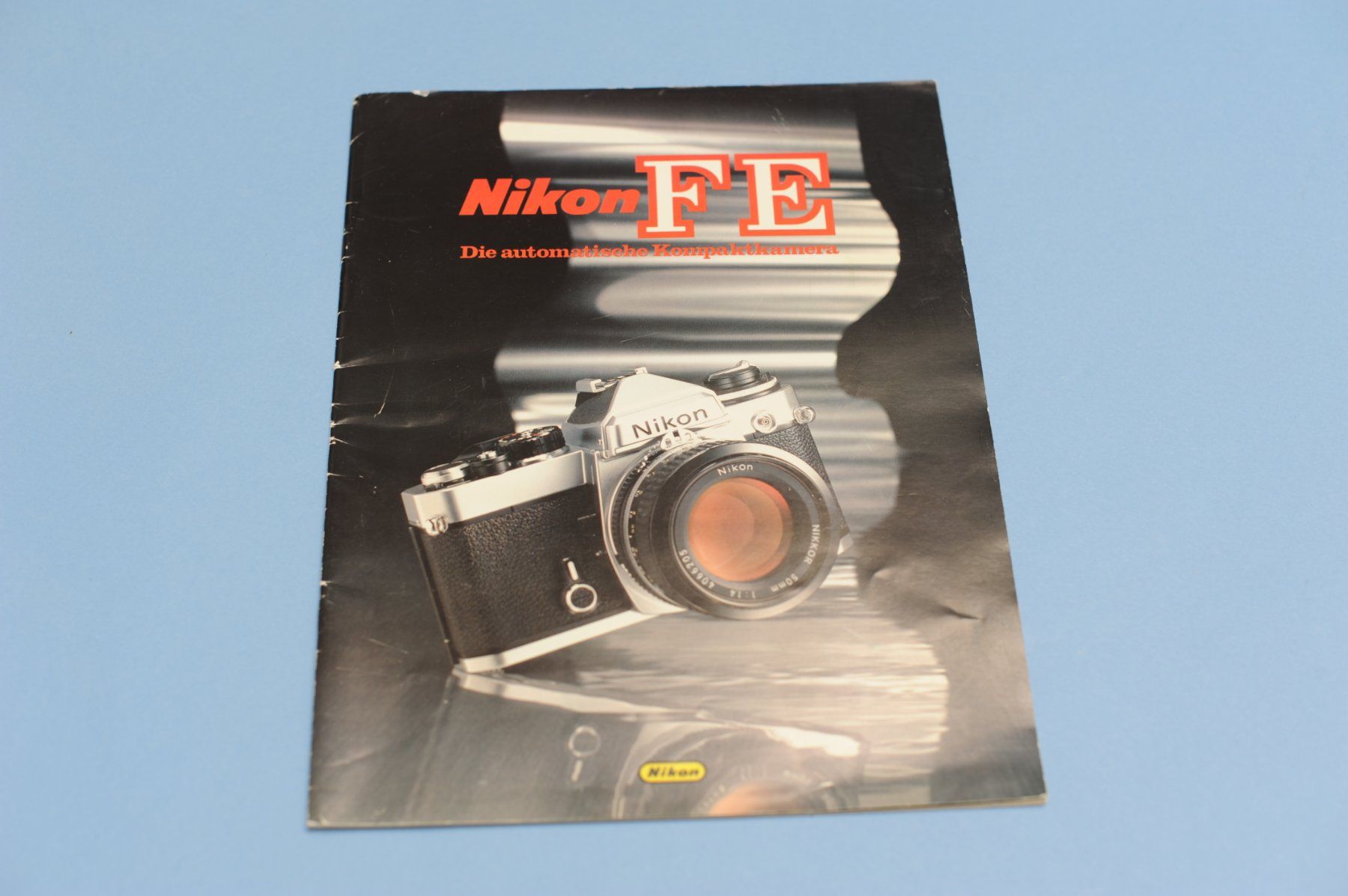 Nikon Fotocamera: NIKON FE - Prospekt - Versand kostenlos – Usato da Zürich venduto da Prathama