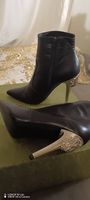 Superbes Boots Versace talon métal Lion 38