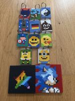 Selbstgemachte Pixel schlüsselanhänger und 2 grosse pixel