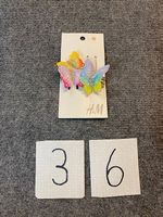 Pinces à cheveux et barrettes papillons