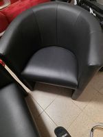 Poltrona nera simil pelle 