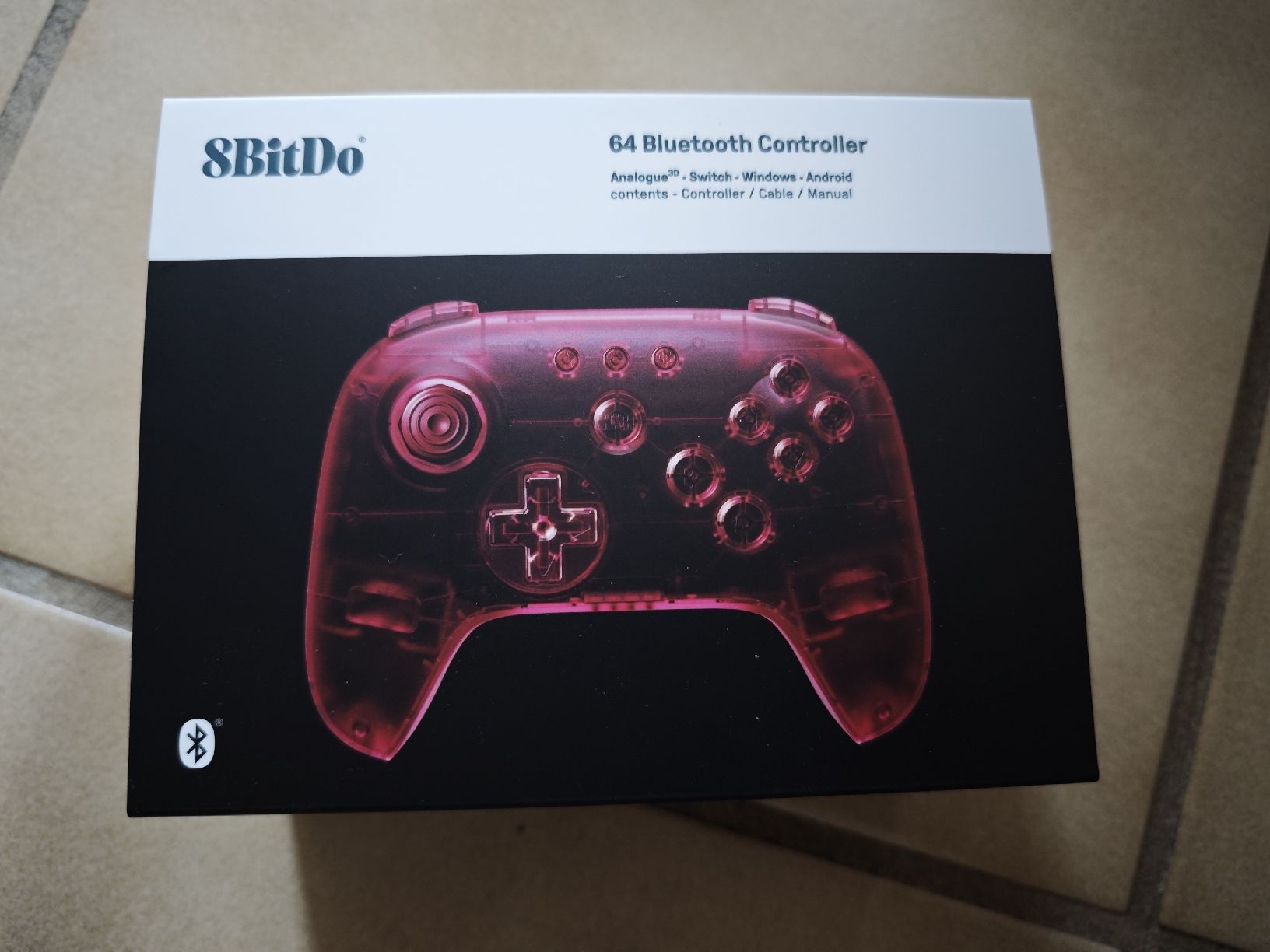 8BitDO Controller: 8BitDo 64 Bluetooth Controller rot transparent neu – Neu und originalverpackt aus Leibstadt von Rova