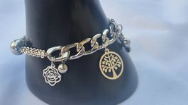 Bracciale con ciondoli albero e farfalla
