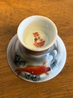 Asiatische Porzellan Saki-Flasche mit Vogel und Schale.