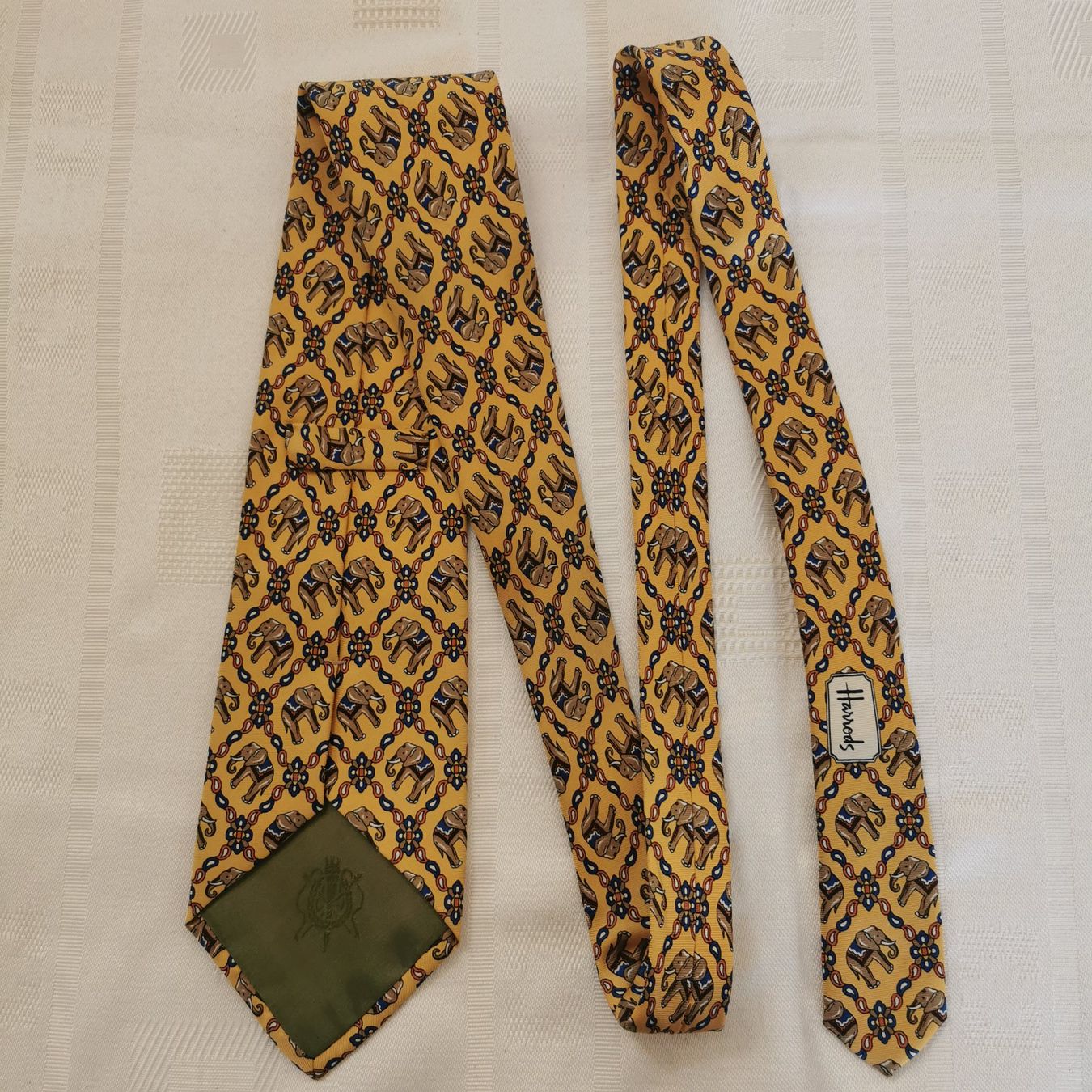 Krawatten: Harrods Krawatte 100% Seide, Elefantenmuster Gold – Gebraucht aus Bern von Second-Hand-Pirat 1