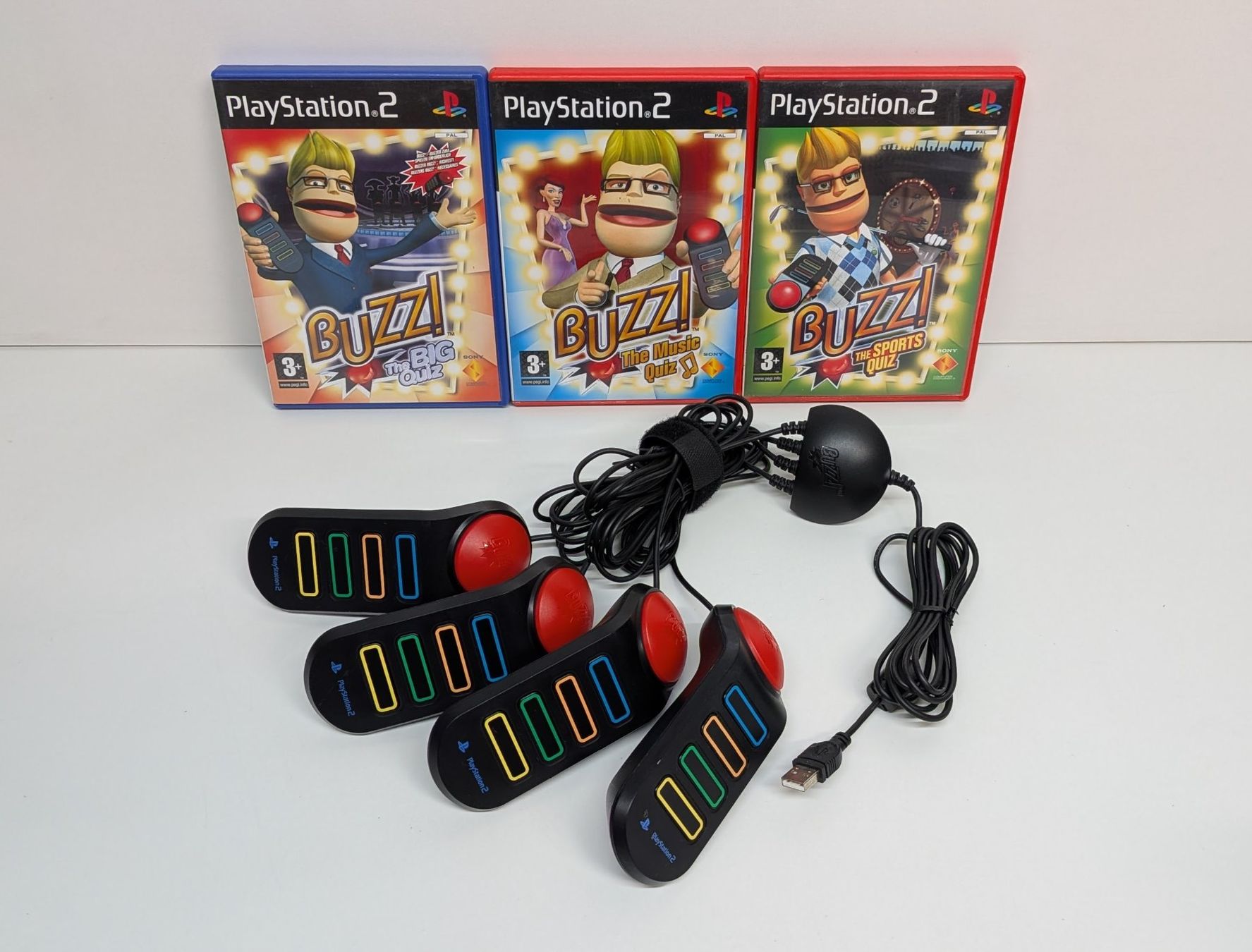 Giochi: 4 PlayStation Buzzer mit 3 Buzz!-Games, PS2 – Usato da Menziken venduto da mame18