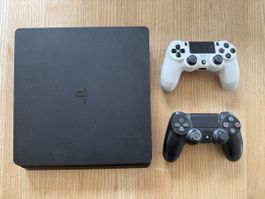 Console Sony PlayStation 4 noir deux manettes