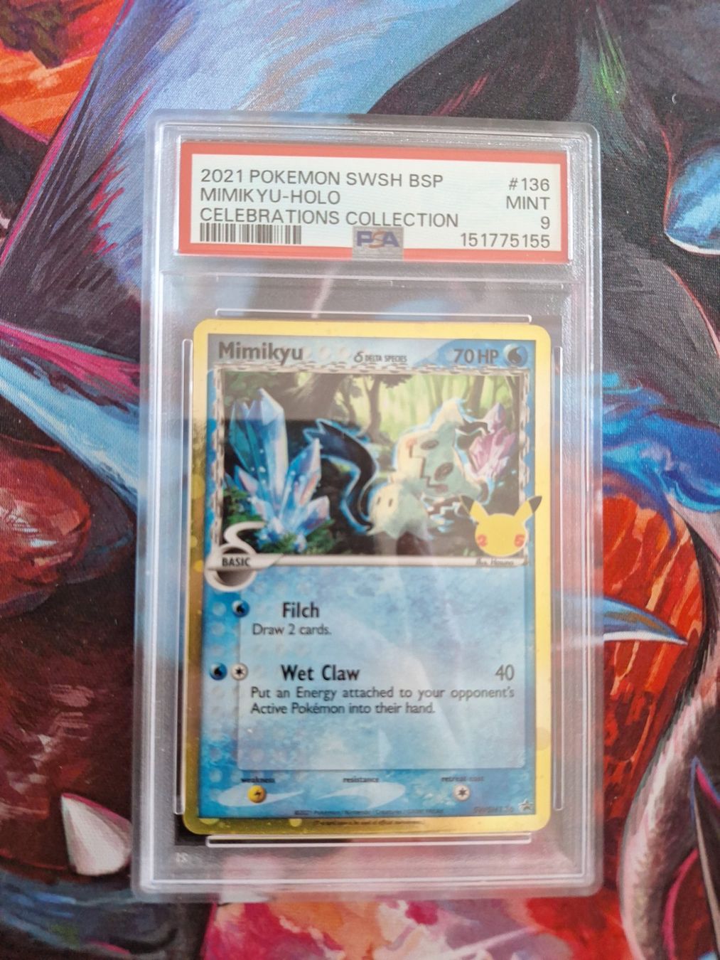 Pokémon Carte collezionabili: Mimikyu Delta Species - Celebrations Promo PSA 9 – Usato da Altstätten SG venduto da GGsGameshop