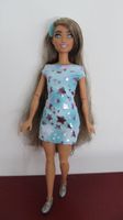 Bewegliche Barbie mit Sternenkleid