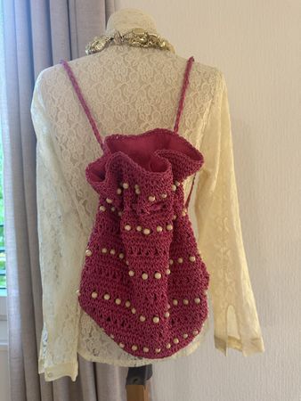 Sac à dos crochet perles rose fuchsia état neuf