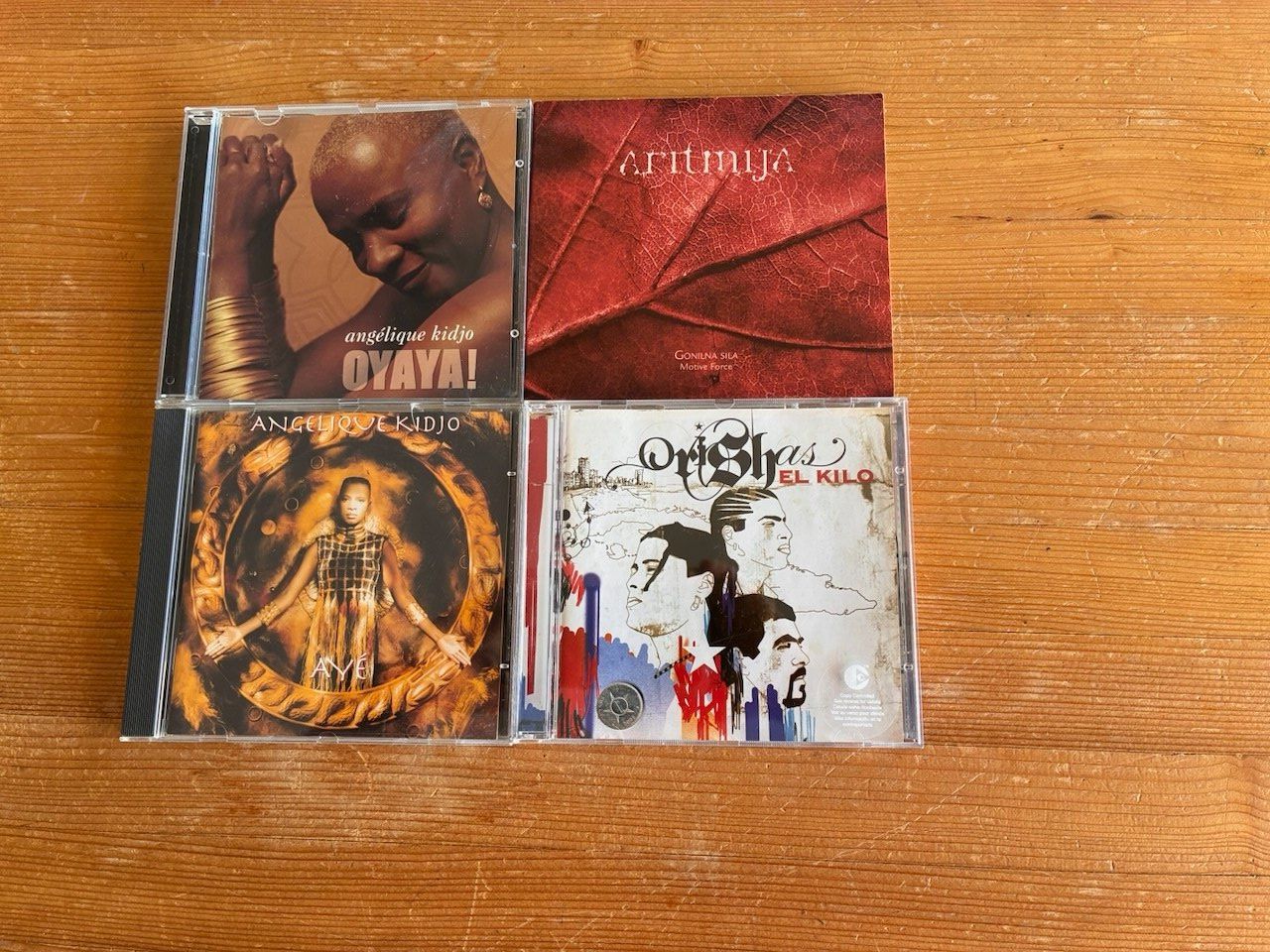 CDs: 2 CDs: Angelique Kidjo, 1 CD: Orishas, 1 CD – Gebraucht aus Wangen b Olten von kl4