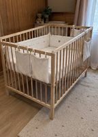 Lit bébé IKEA en bois + accessoires