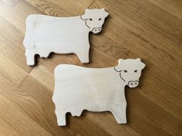 2 Holzbrettli Chüeli!