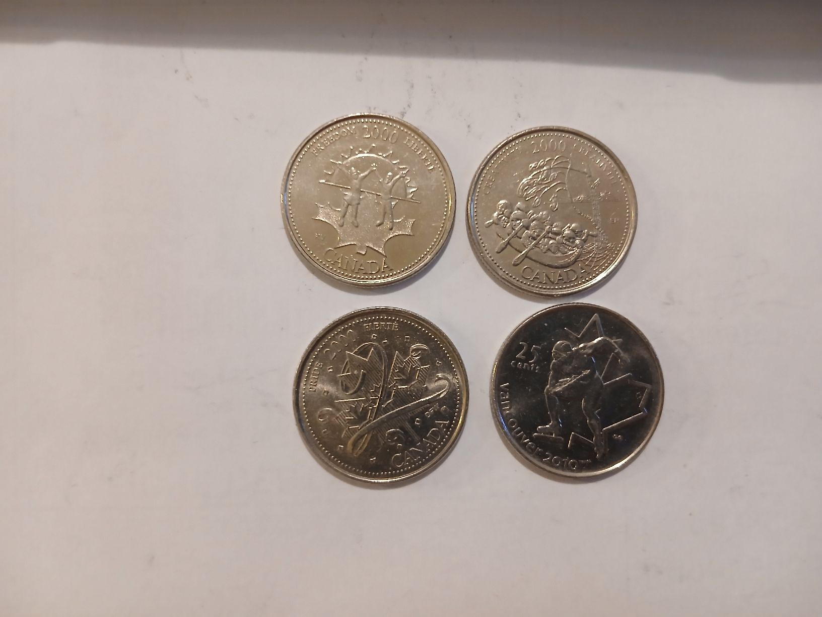 Tutti le monete: Ensemble de 4 pièces canadiennes 25 cents 2000, 2010  – Usato da Marly venduto da globetrotter1723