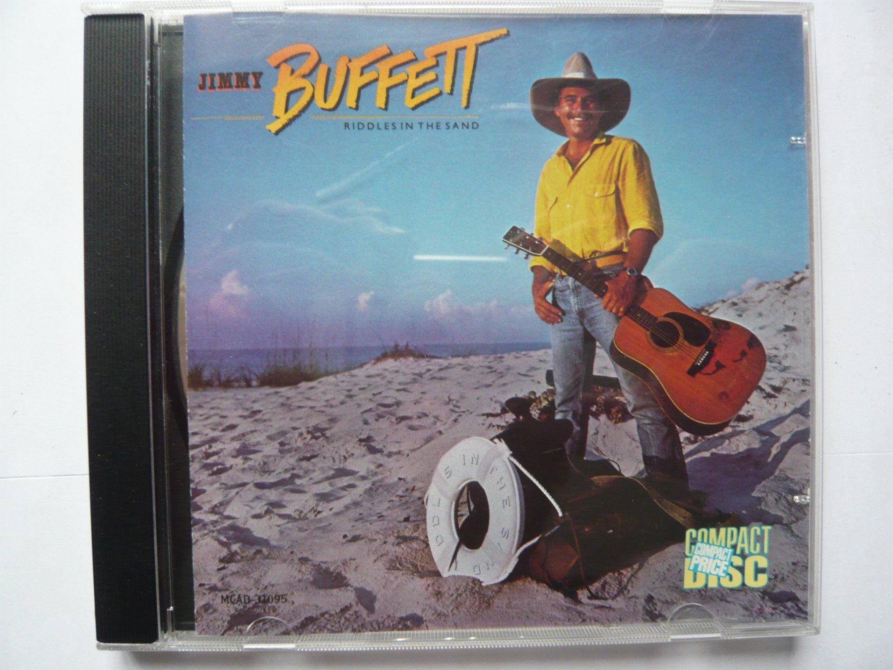 CDs: JIMMY BUFFETT Riddles In The Sand – Gebraucht aus Winterthur von Cajun