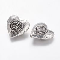 Perle Metall Herz Muschelmotiv gelocht 31x30x11mm
