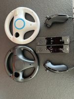 Nintendo Wii 2 Wii Remote+, 2 Nunchuk, 2 volants Mario Kart