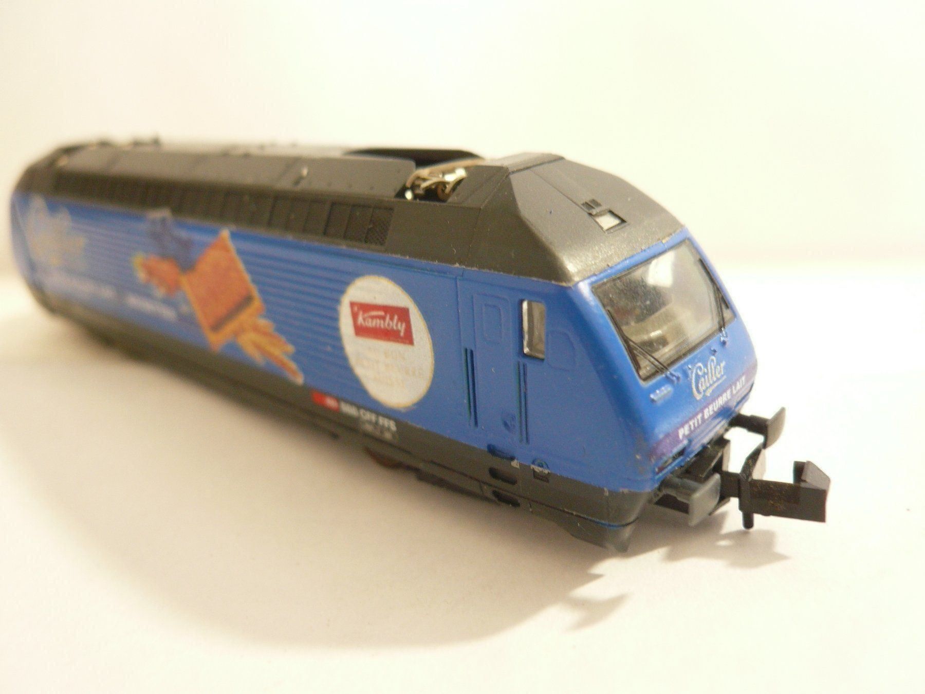 Trix Modelleisenbahnen: MINITRIX RE 460   "  CAILLER NOISETTES KAMBLY  " – Neu und originalverpackt aus Pfaffnau von nolff 3