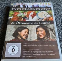 Die Ökonomie des Glücks (21002)