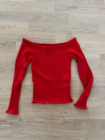 Schulterloser Pullover