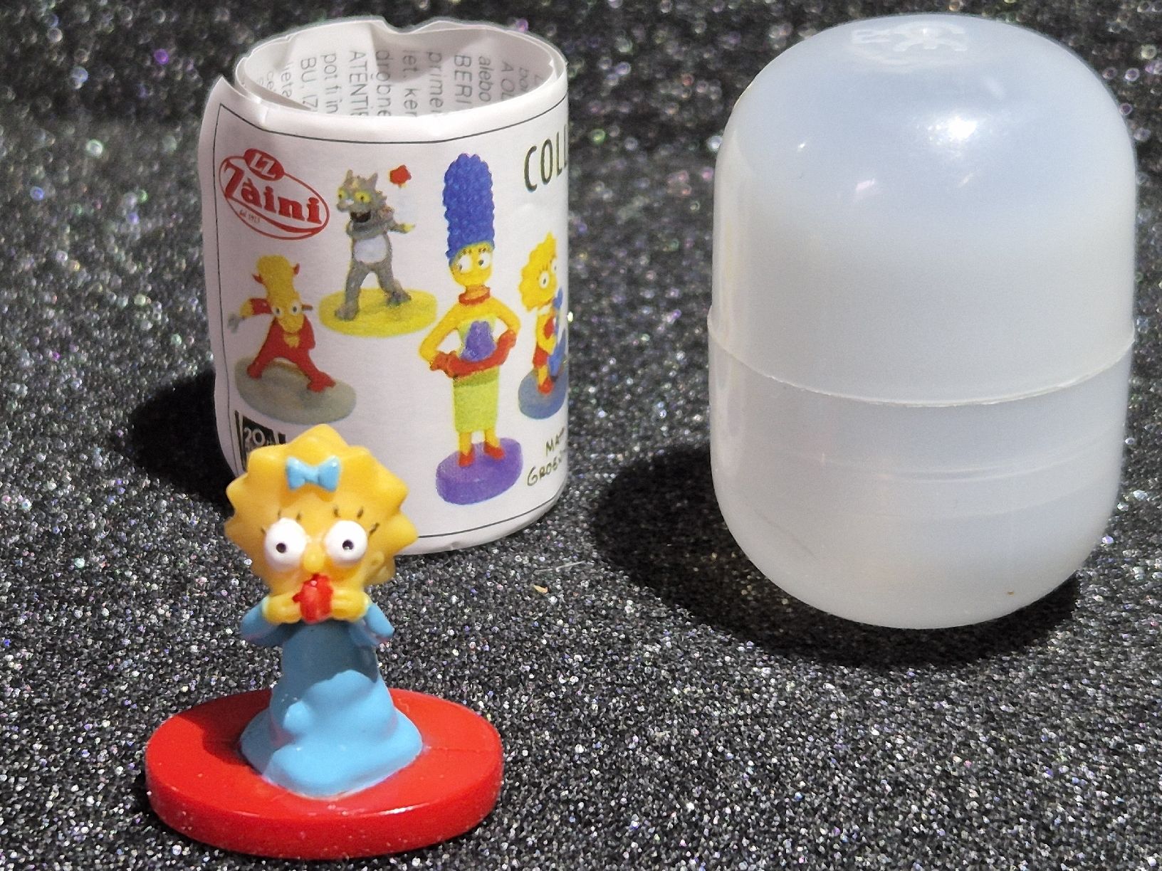Statuette: Ü-Ei Figur Simpsons Maggie mit Schnuller – Nuovo (secondo la descrizione) da Burgdorf venduto da MIDICLORIAN 1