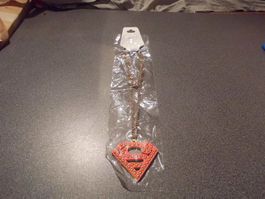 Kette Anhänger Superman, rosa/gelbe Punkte