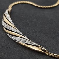 Edles Collier mit 11 Diamanten beschmückt in 750 Gelbgold