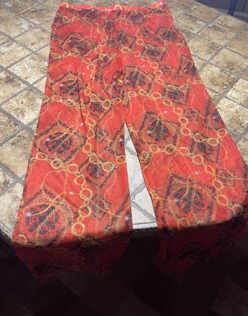 Pantaloni estivi donna eleganti con catene color corallo tag