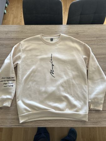Pull blanc cassé 