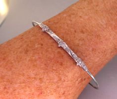 Armreif 925er Silber mit synthetischen Steinchen, rhodiniert