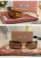 Sonnenbrille Miu Miu braun mit Etui neu ungetragen 