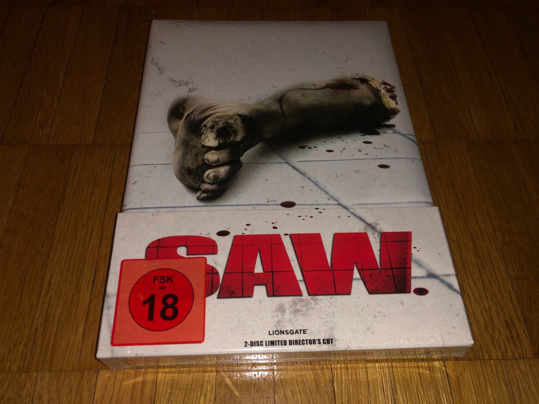 Tutti i DVDs: Saw - MEDIABOOK - WATTIERT - UNRATED – Nuovo e nell'imballaggio originale da Basel venduto da havsok