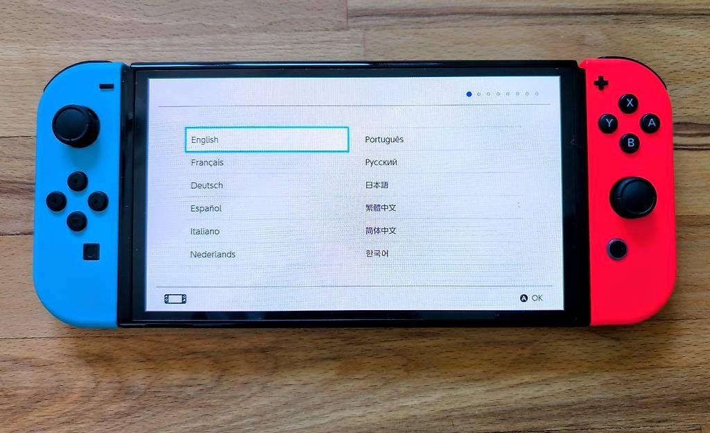 Nintendo Konsolen: Nintendo Switch OLED - mit Garantie + Ringfit Adventure – Gebraucht aus Aarau von Lepto