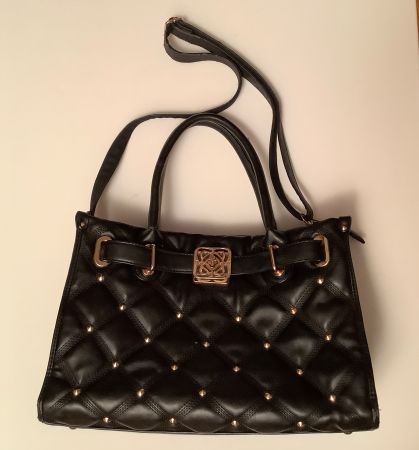 Sac noir simili cuir 25cm sur 34cm épaisseur 18cm