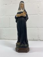 Heilige  Rita von Cascia mit Kruzifix und Rosenkranz