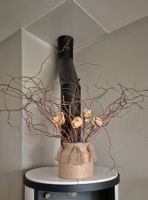 Glasvase mit Naturgesteck