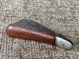 Grosses altes Hakenmesser Holzgriff