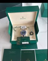 ROLEX 2025 Stahl/Gold Submariner Date 41mm ZB Königsblau